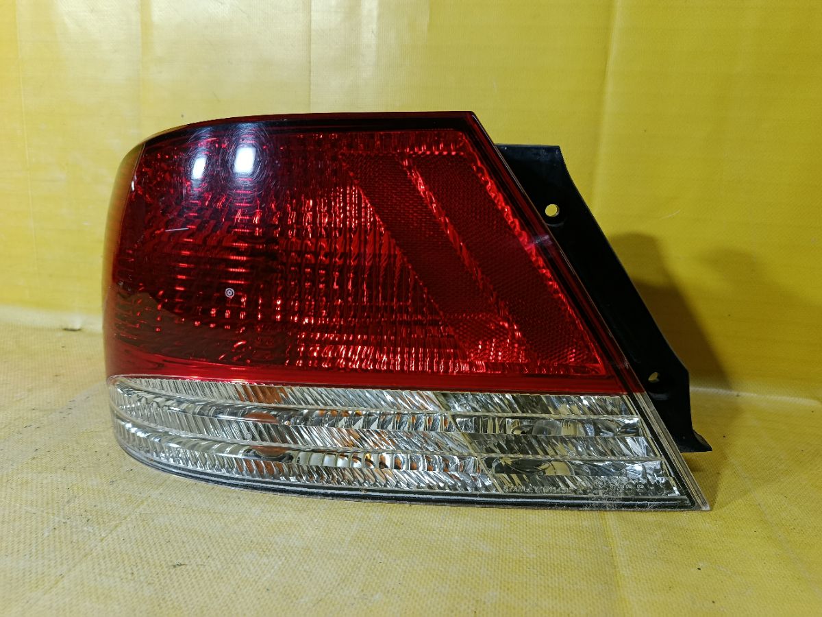 Стоп P1143 P1143 на Mitsubishi Lancer Cedia CS2A Фото 1