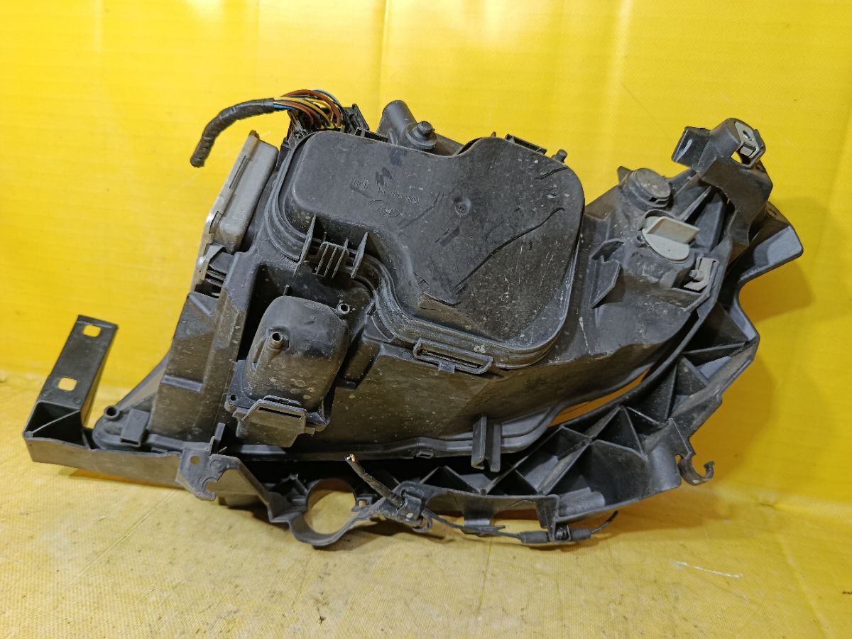 Фара 631169427409 на Bmw 3-Series E91-VW72 Фото 6