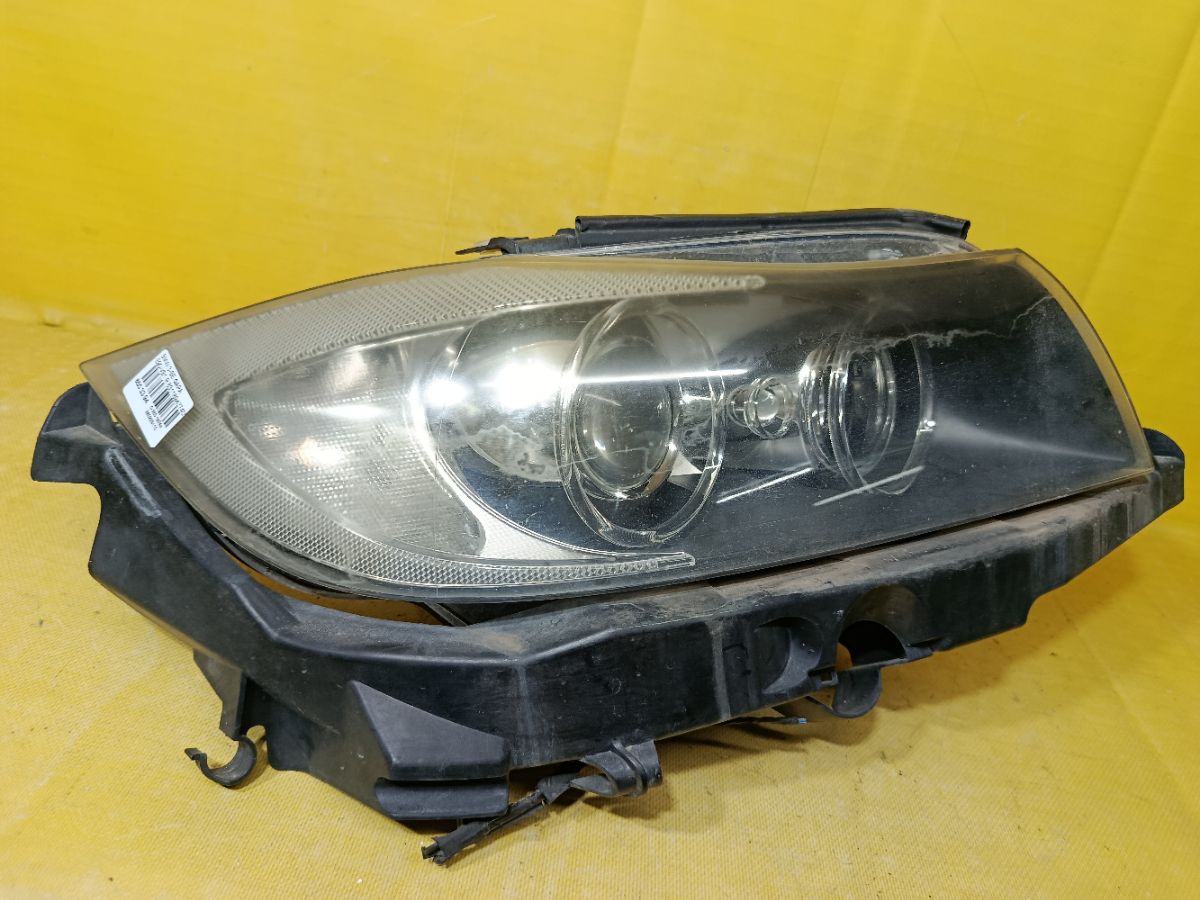 Фара 631169427409 на Bmw 3-Series E90-VB12 Фото 2