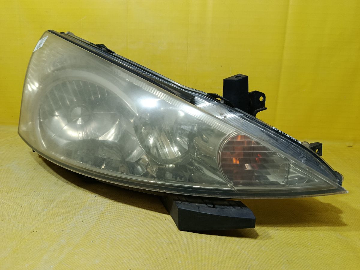 Фара 100-87649 100-87649 на Mitsubishi Grandis NA4W Фото 1