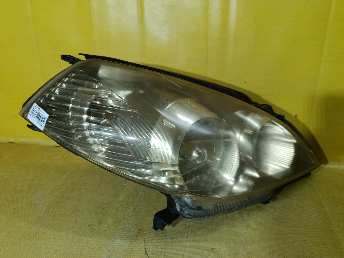 Фара 1699 1699 на Nissan Wingroad WFY11 Фото 3