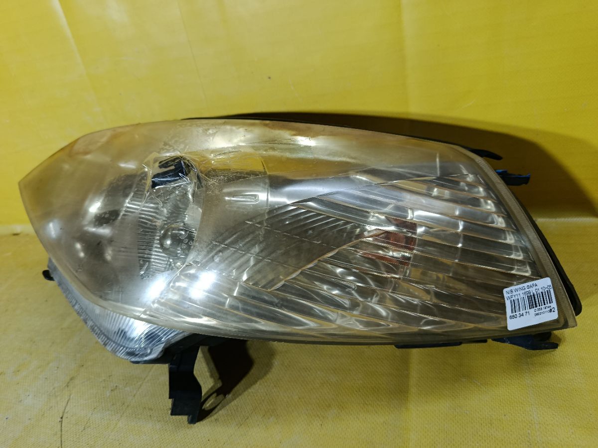 Фара 1699 1699 на Nissan Wingroad WFY11 Фото 2