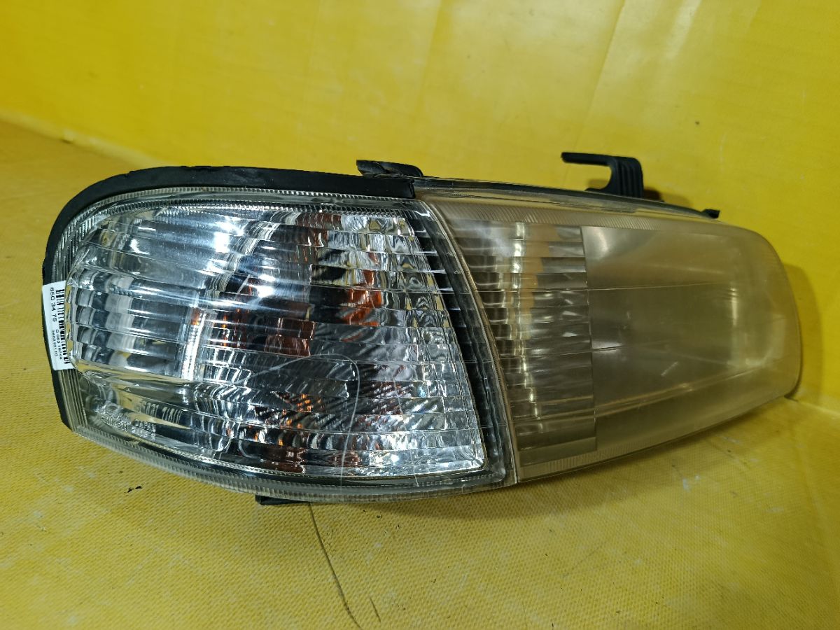 Фара 1602 1602 на Nissan Sunny FB15 Фото 2