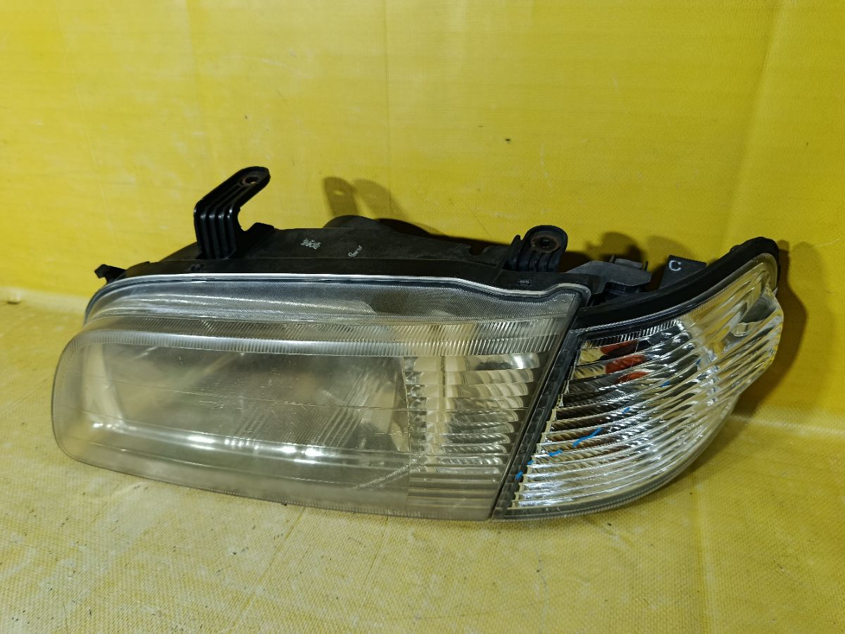 Фара 1602 1602 на Nissan Sunny FB15 Фото 3