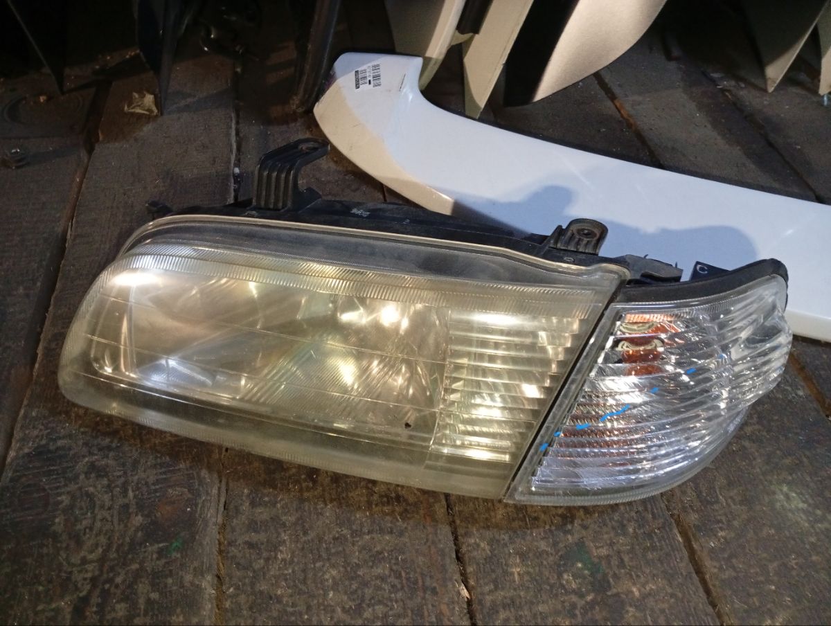 Фара 1602 1602 на Nissan Sunny FB15 Фото 7