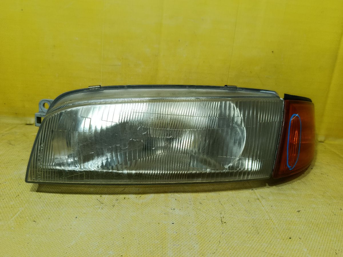 Фара 001-7507 001-7507 на Mitsubishi Lancer CK2A Фото 1