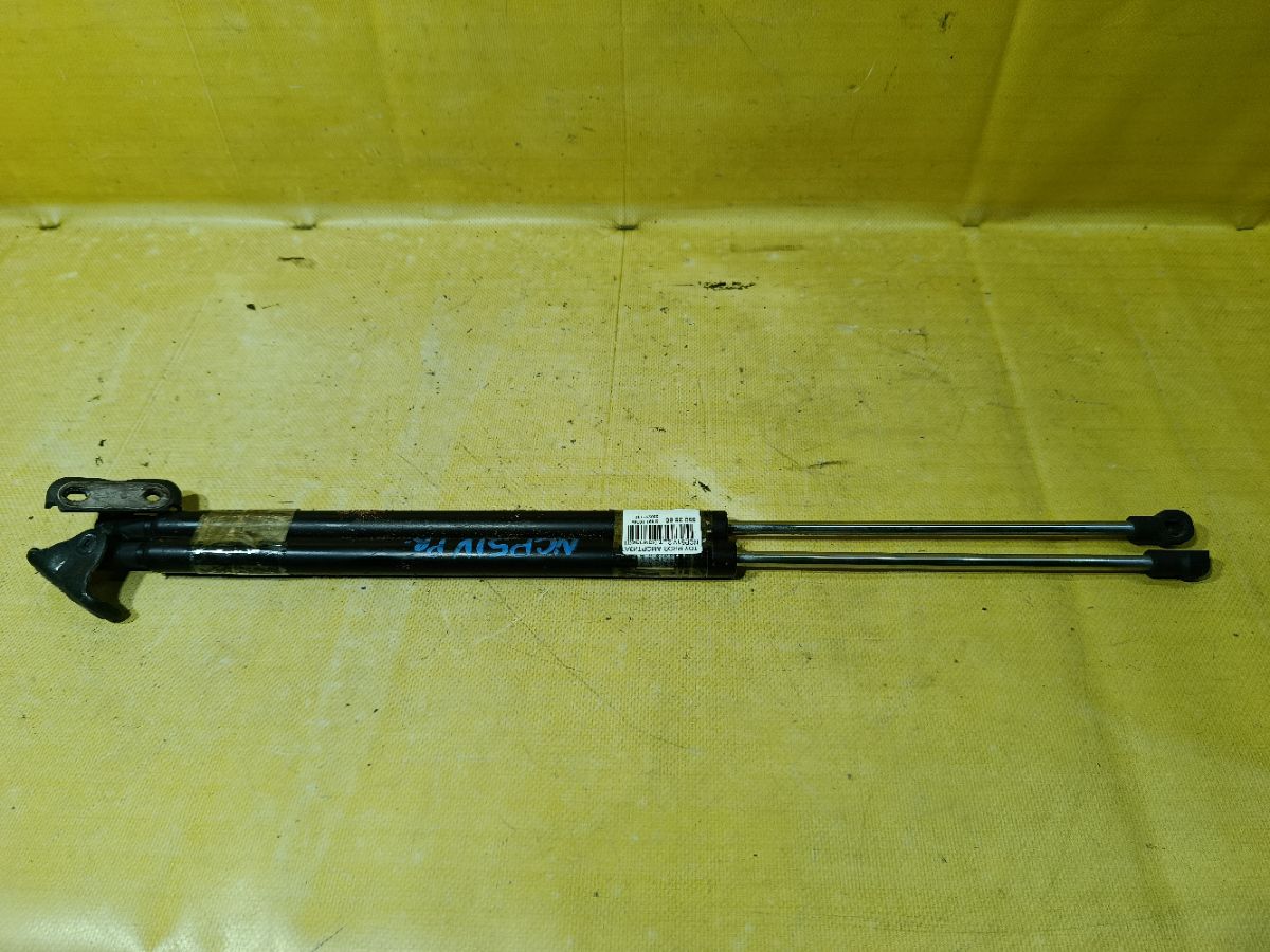 Амортизатор двери на Toyota Probox NCP51V Фото 1