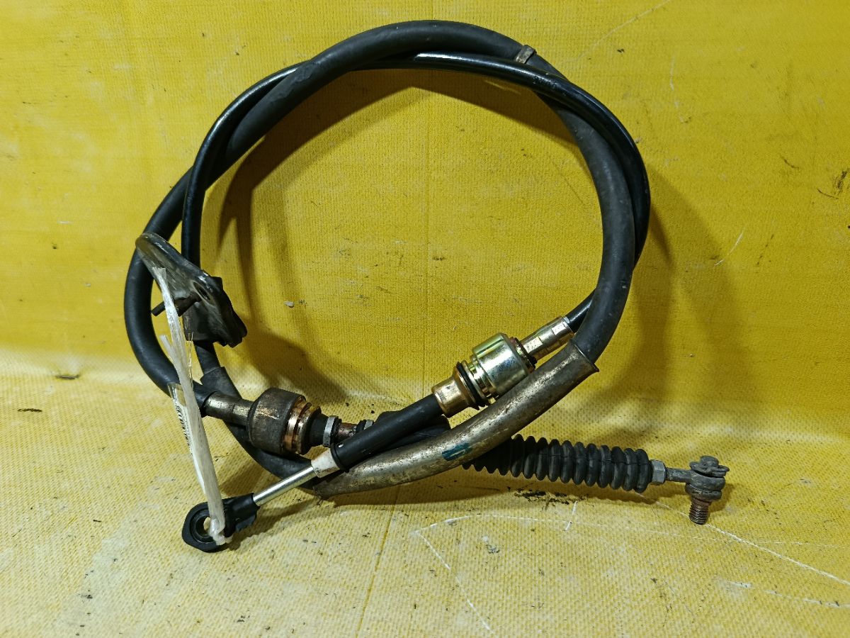 Тросик на коробку передач на Toyota Raum EXZ15 5E-FE Фото 1