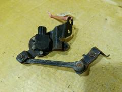 Датчик регулировки наклона фар на Mitsubishi Grandis NA4W, Переднее расположение