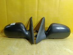 Зеркало двери боковой на Nissan Sunny FB15