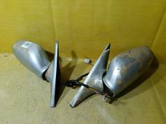 Зеркало двери боковой на Nissan Bluebird HU13