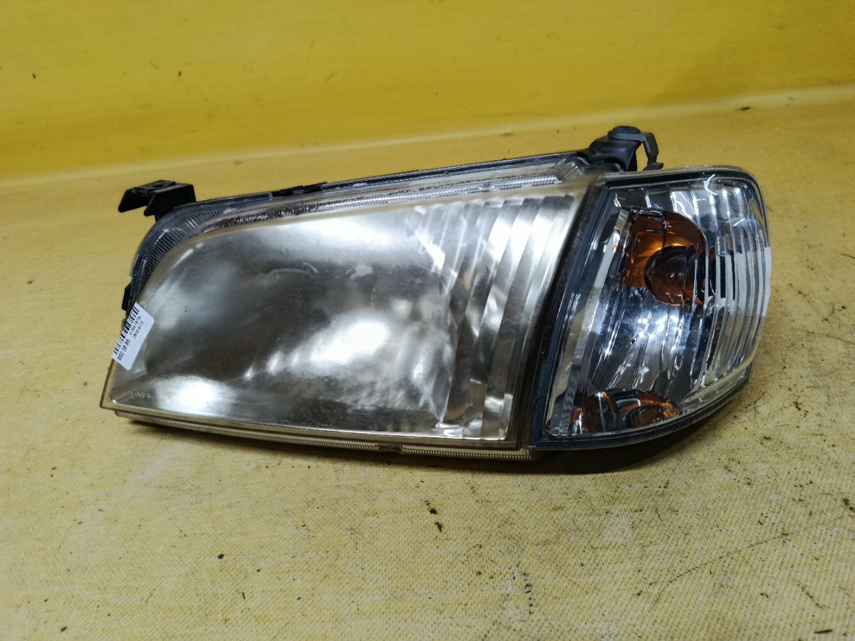 Фара P1001 P1001 на Mazda Demio DW3W Фото 1