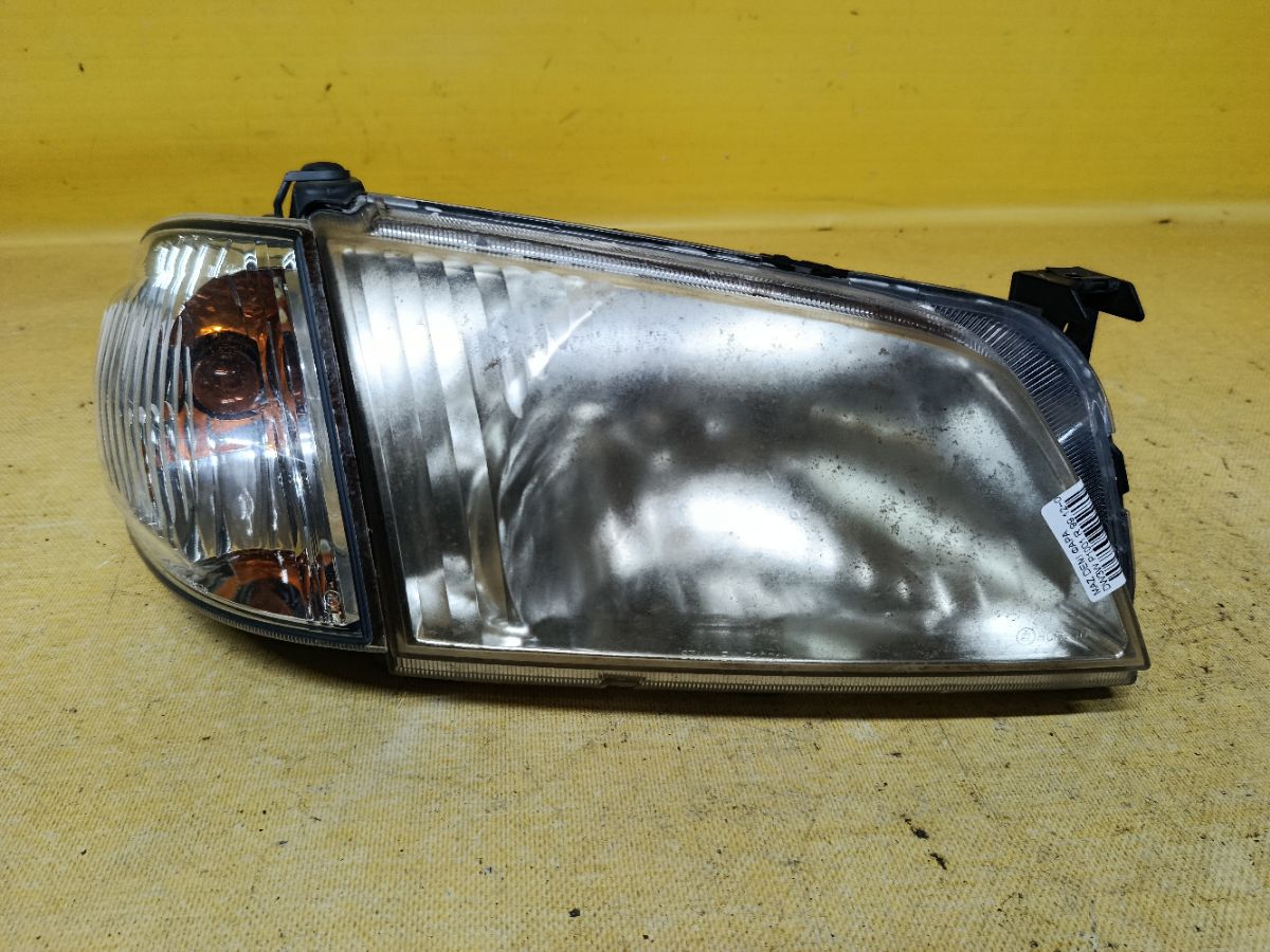 Фара P1001 P1001 на Mazda Demio DW3W Фото 1