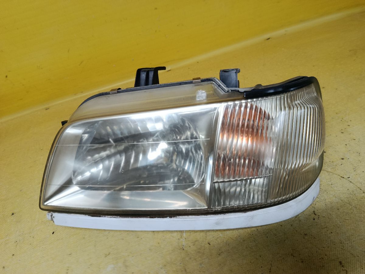 Фара 100-66258 100-66258 на Nissan Cube AZ10 Фото 1