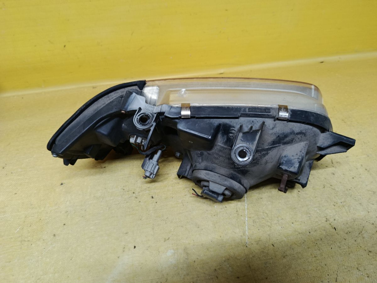 Фара 100-66258 100-66258 на Nissan Cube AZ10 Фото 4