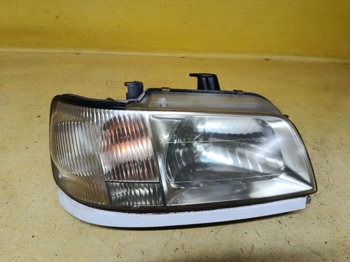 Фара 100-66258 100-66258 на Nissan Cube AZ10 Фото 1