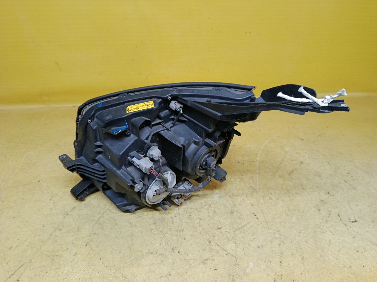 Фара 28-203 28-203 на Toyota Voxy ZRR70G Фото 4