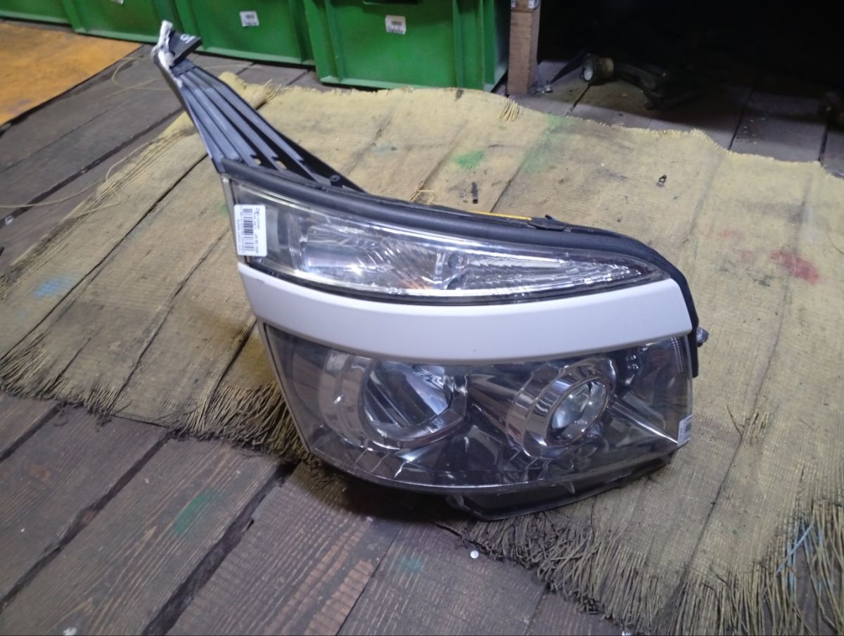 Фара 28-203 28-203 на Toyota Voxy ZRR70G Фото 8