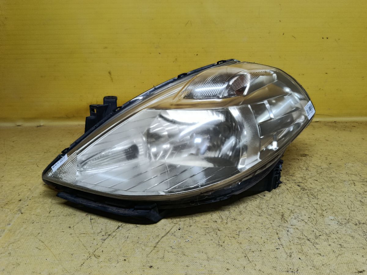 Фара P7779 P7779 на Nissan Tiida C11 Фото 1
