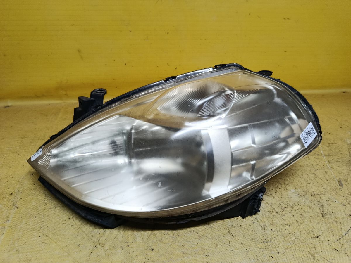 Фара P7779 P7779 на Nissan Tiida C11 Фото 1