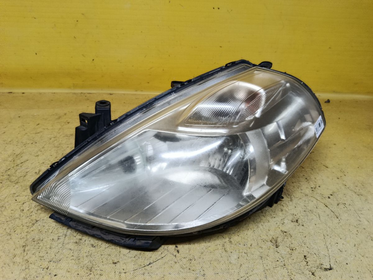 Фара P7779 P7779 на Nissan Tiida C11 Фото 1