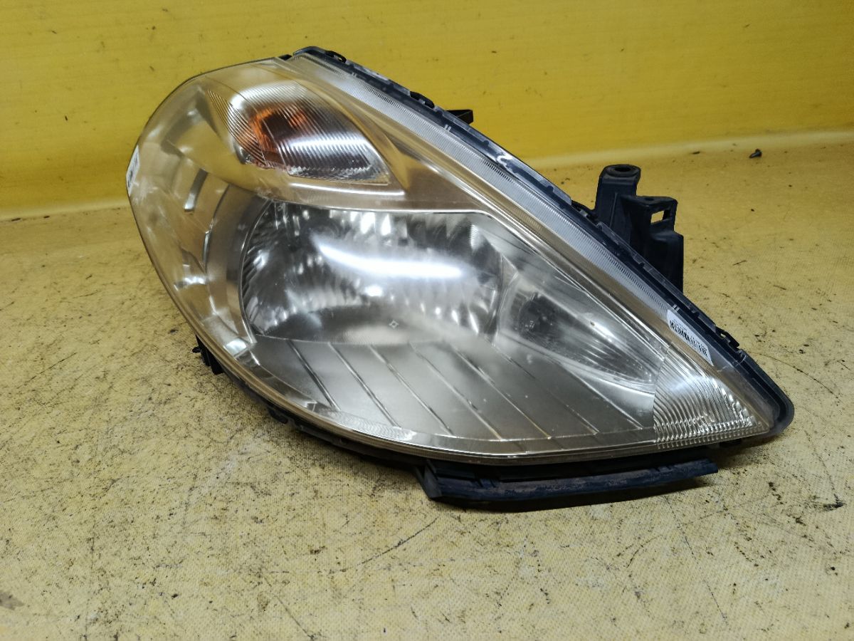 Фара P7779 P7779 на Nissan Tiida C11 Фото 1