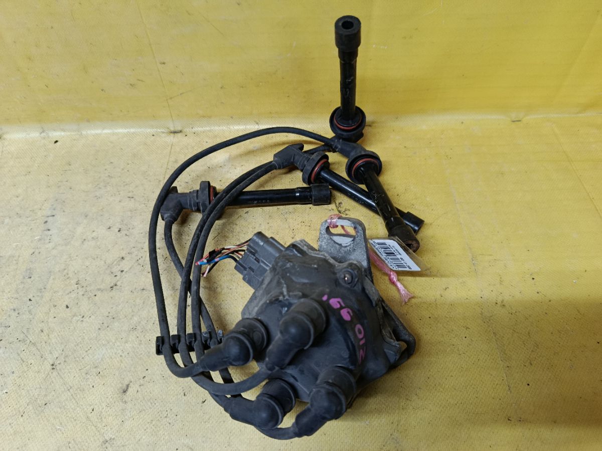 Трамблер 22100-72B00 на Nissan Cube Z10 CG13DE Фото 1