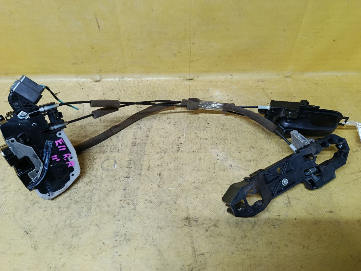 Замок двери на Nissan Note E11 Фото 1