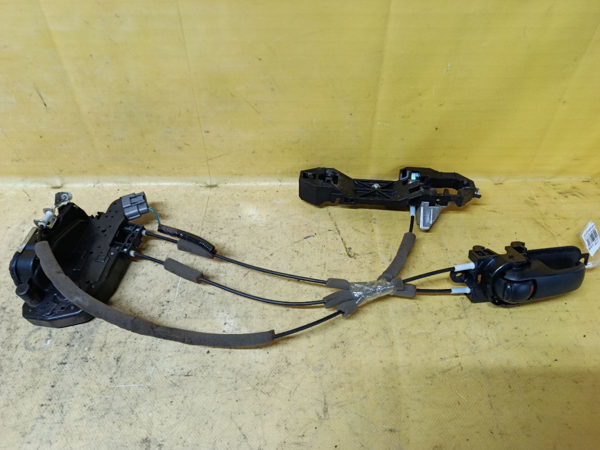 Замок двери на Nissan Note E11 Фото 1