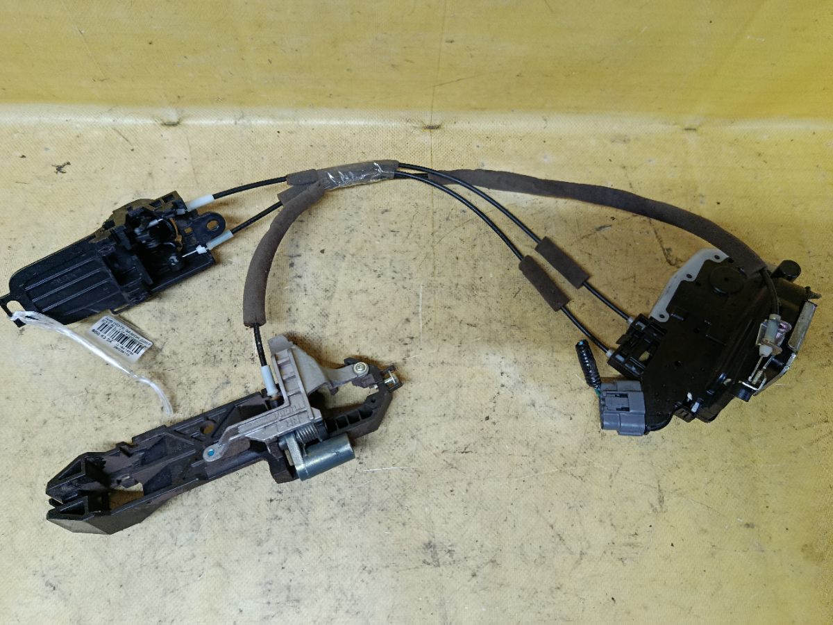 Замок двери на Nissan Note E11 Фото 2