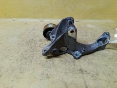 Ролик натяжной на Nissan Note E12 HR12DDR Фото 2