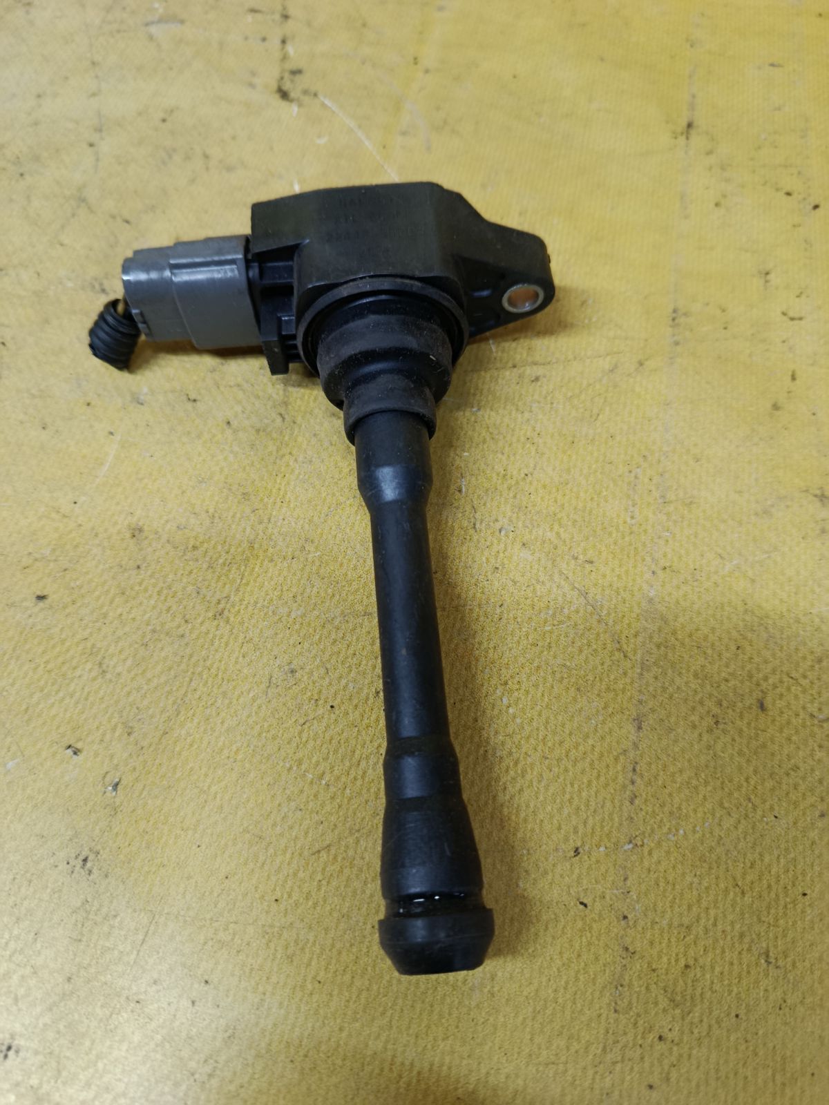 Катушка зажигания 22448-3HD0A на Nissan Note E12 HR12DDR Фото 1