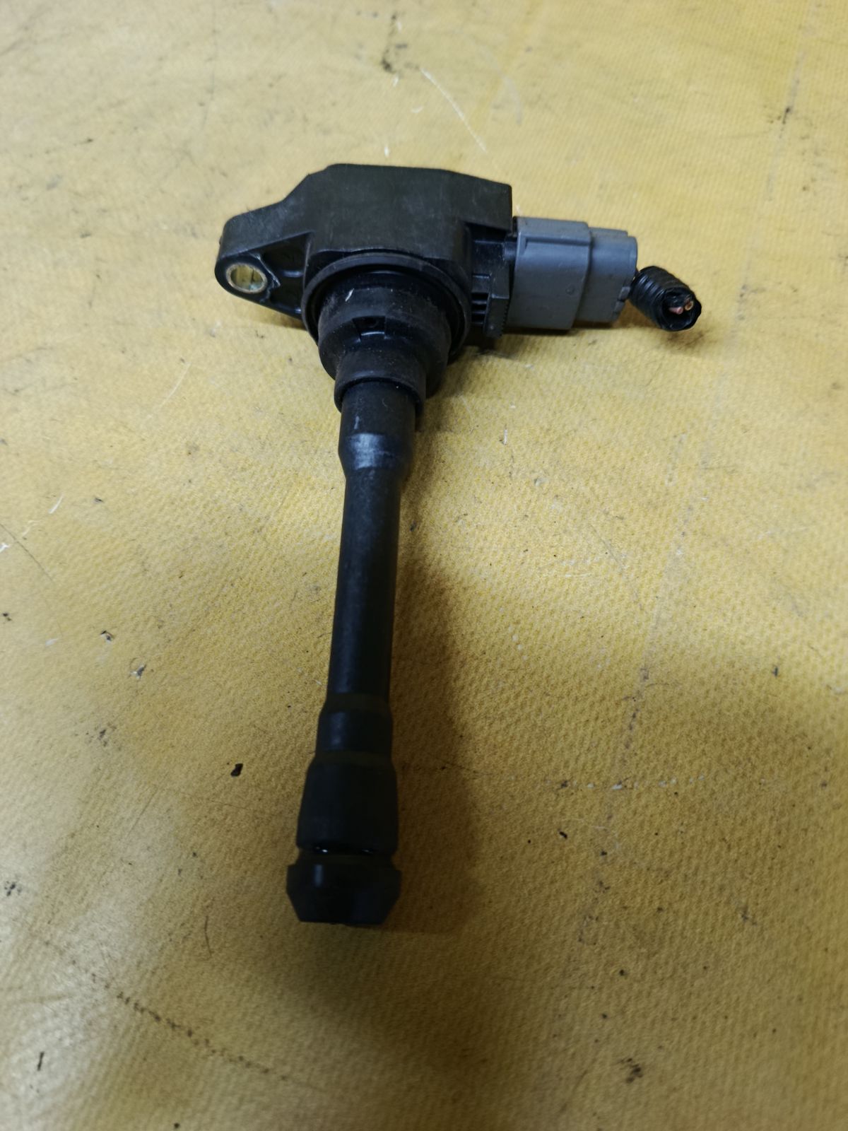 Катушка зажигания 22448-3HD0A на Nissan Note E12 HR12DDR Фото 1