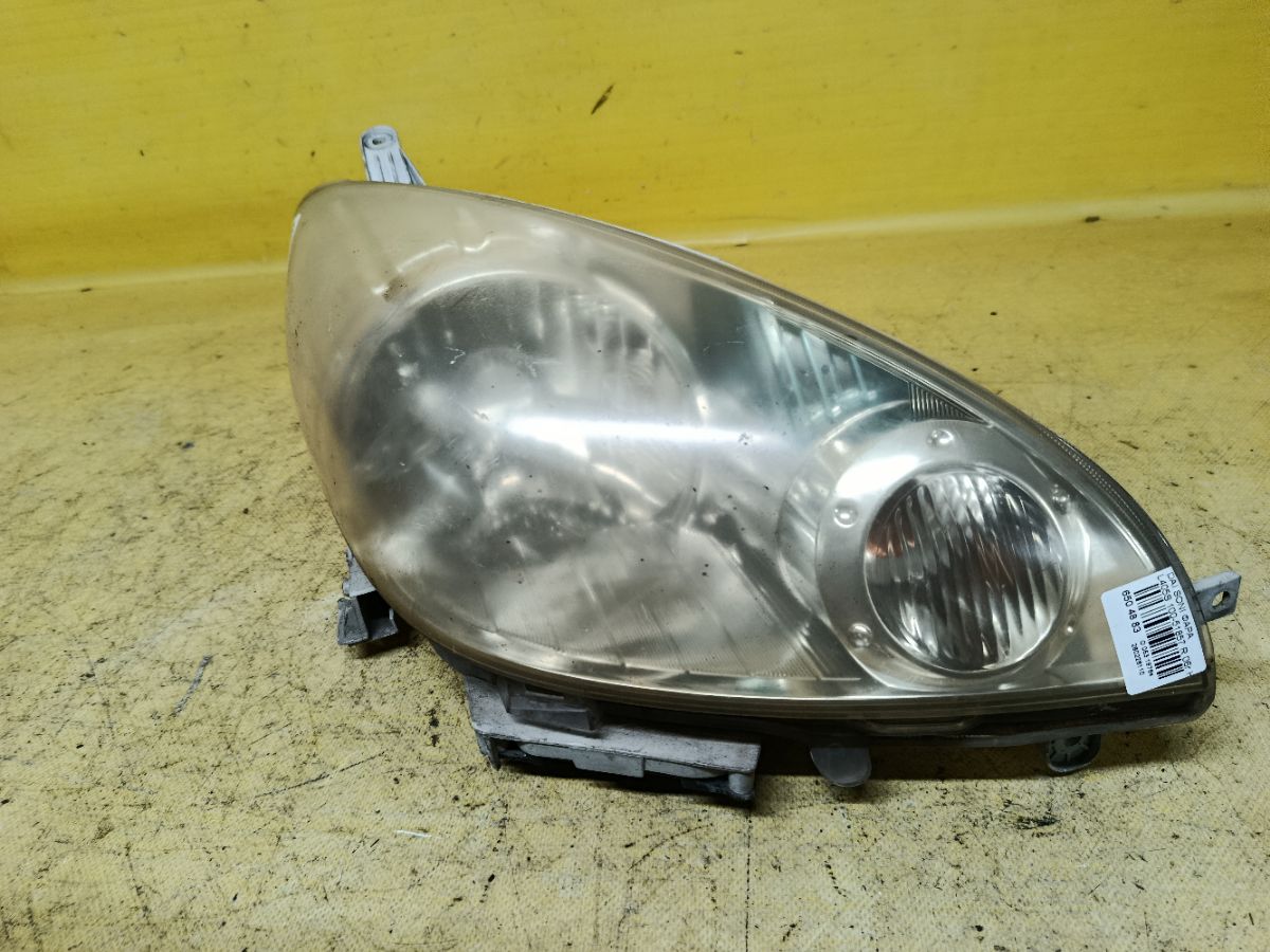 Фара 100-51857 100-51857 на Daihatsu Sonica L405S Фото 1