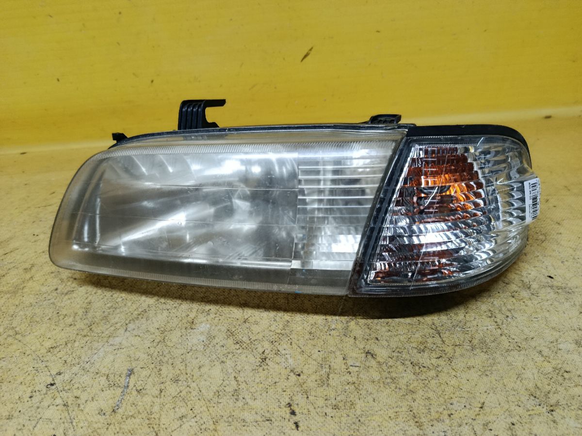 Фара 1602 1602 на Nissan Sunny FB15 Фото 2