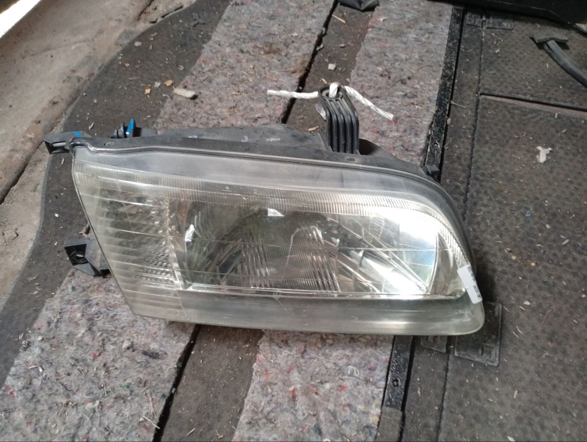 Фара 1602 1602 на Nissan Sunny FB15 Фото 7