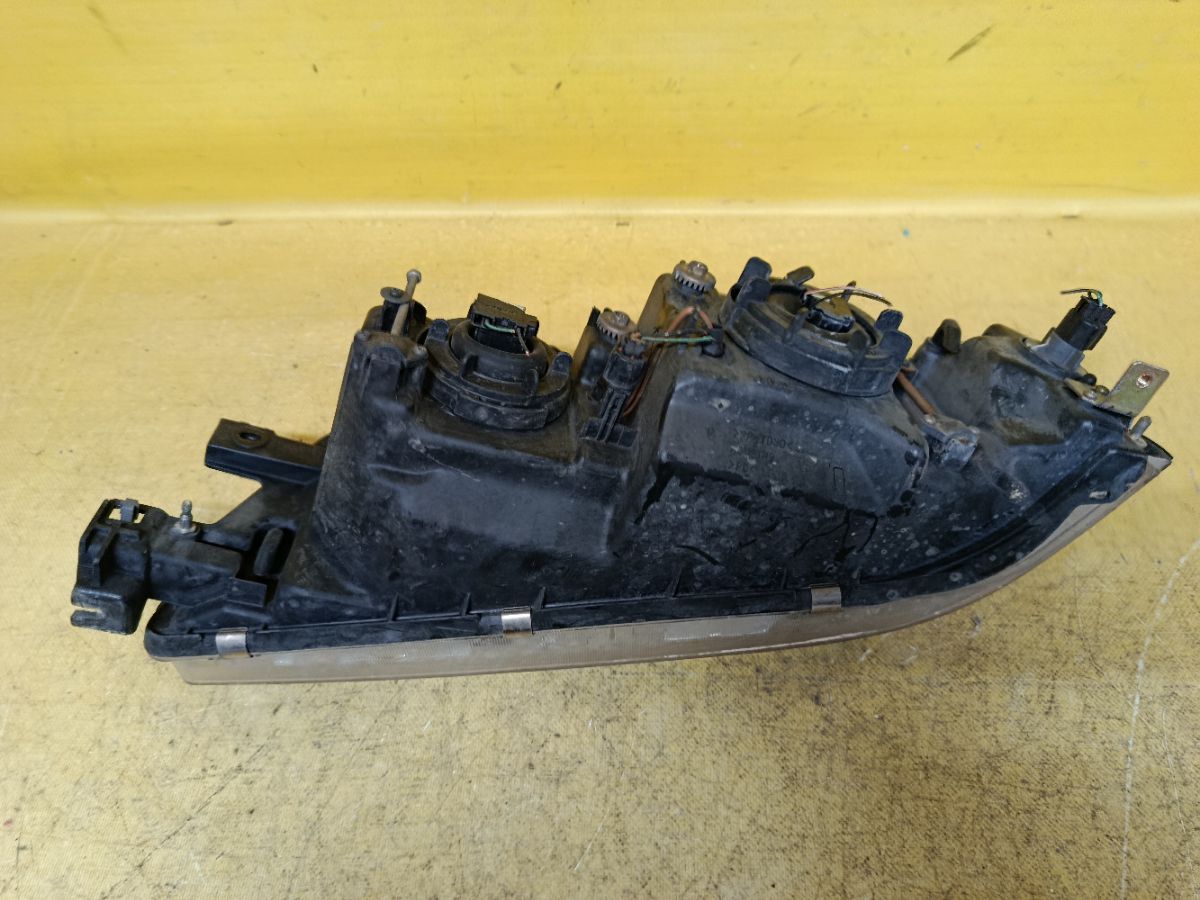 Фара 7090 7090 на Mitsubishi Diamante F31A Фото 7