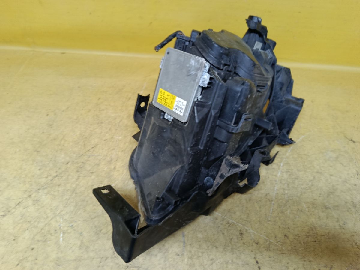 Фара 631169427409 на Bmw 3-Series E90-VA72 Фото 6