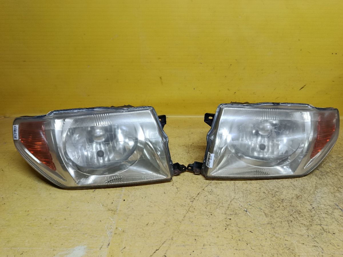 Фара 100-87312 100-87312 на Mitsubishi Pajero Io H71W Фото 1