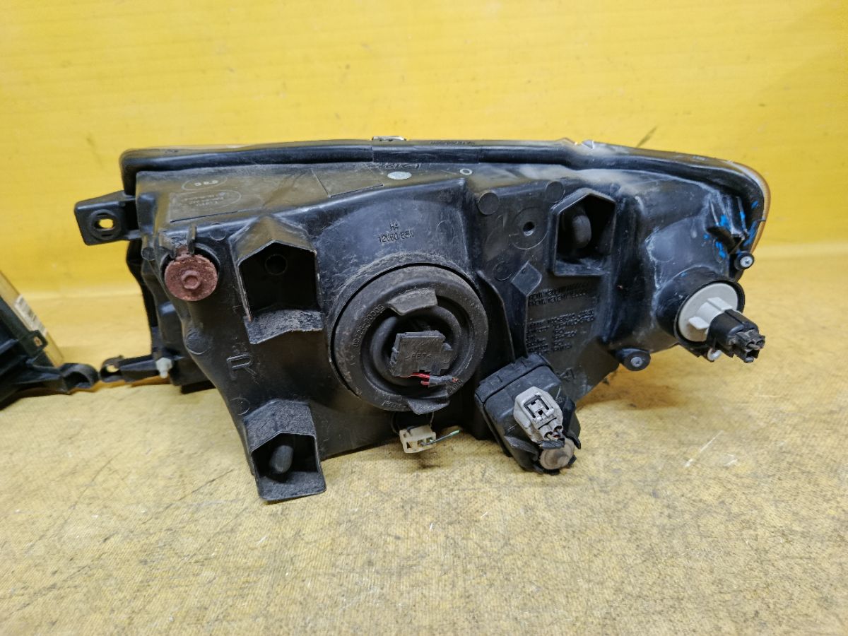 Фара 100-87312 100-87312 на Mitsubishi Pajero Io H71W Фото 7