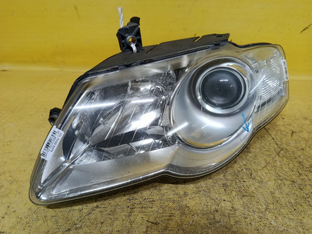 Фара 89312179 на Volkswagen Passat 3C Фото 1
