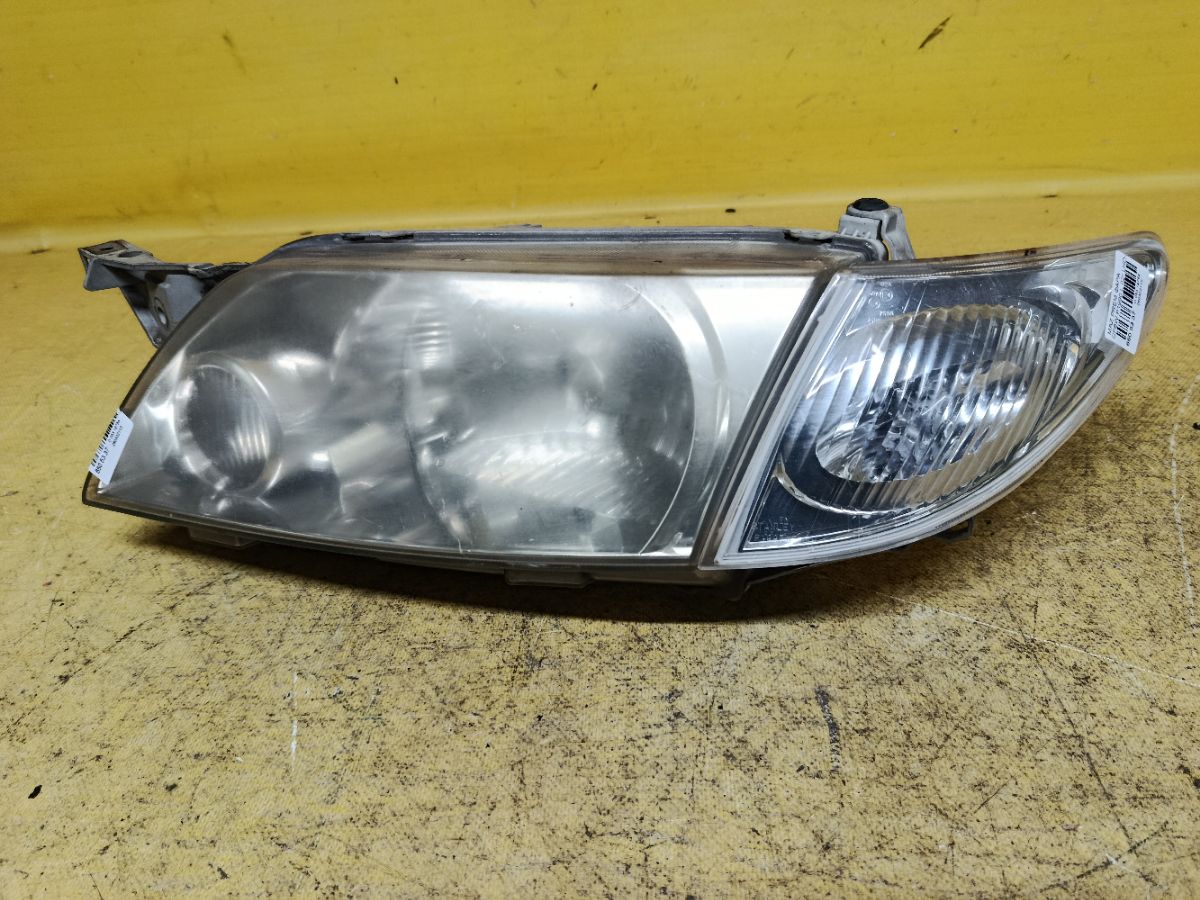 Фара P1990 P1990 на Mazda Premacy CP8W Фото 2