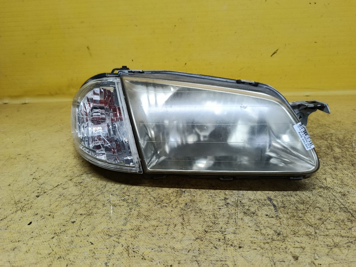 Фара R6888 R6888 на Mazda Familia BJ5P Фото 1