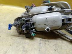 Ручка двери на Nissan X-Trail NT30 Фото 4