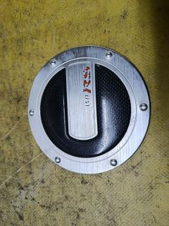 Лючок на Toyota Vitz NCP13