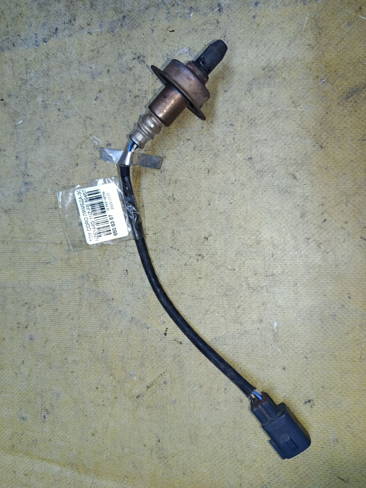 Лямбда-зонд 89467-12220, 89465-12870, LC-743-5750 на Toyota Corolla Fielder NZE144G 1NZ-FE Фото 1