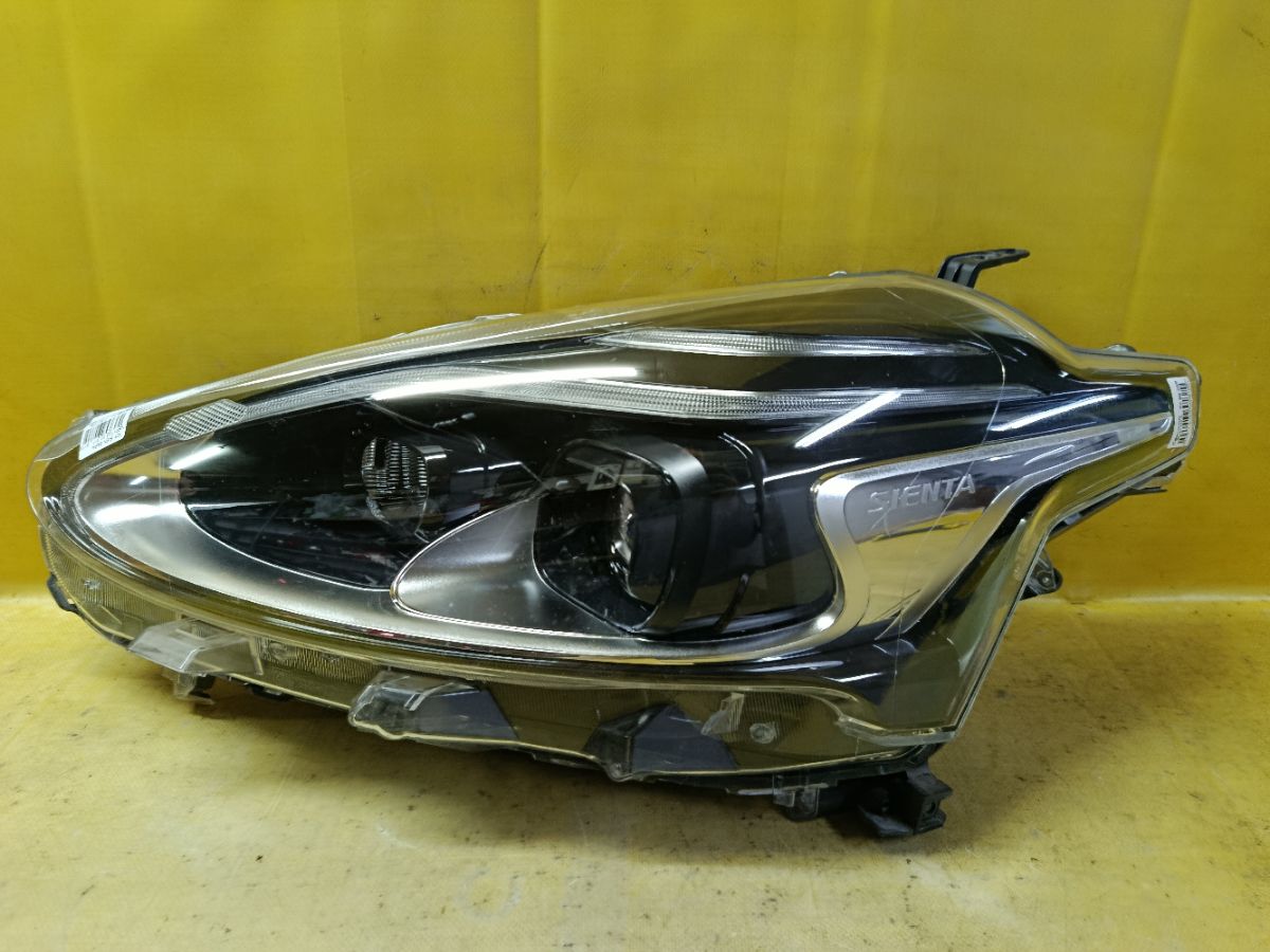 Фара 52-317 52-317,81150-52N00 на Toyota Sienta NSP170G Фото 1