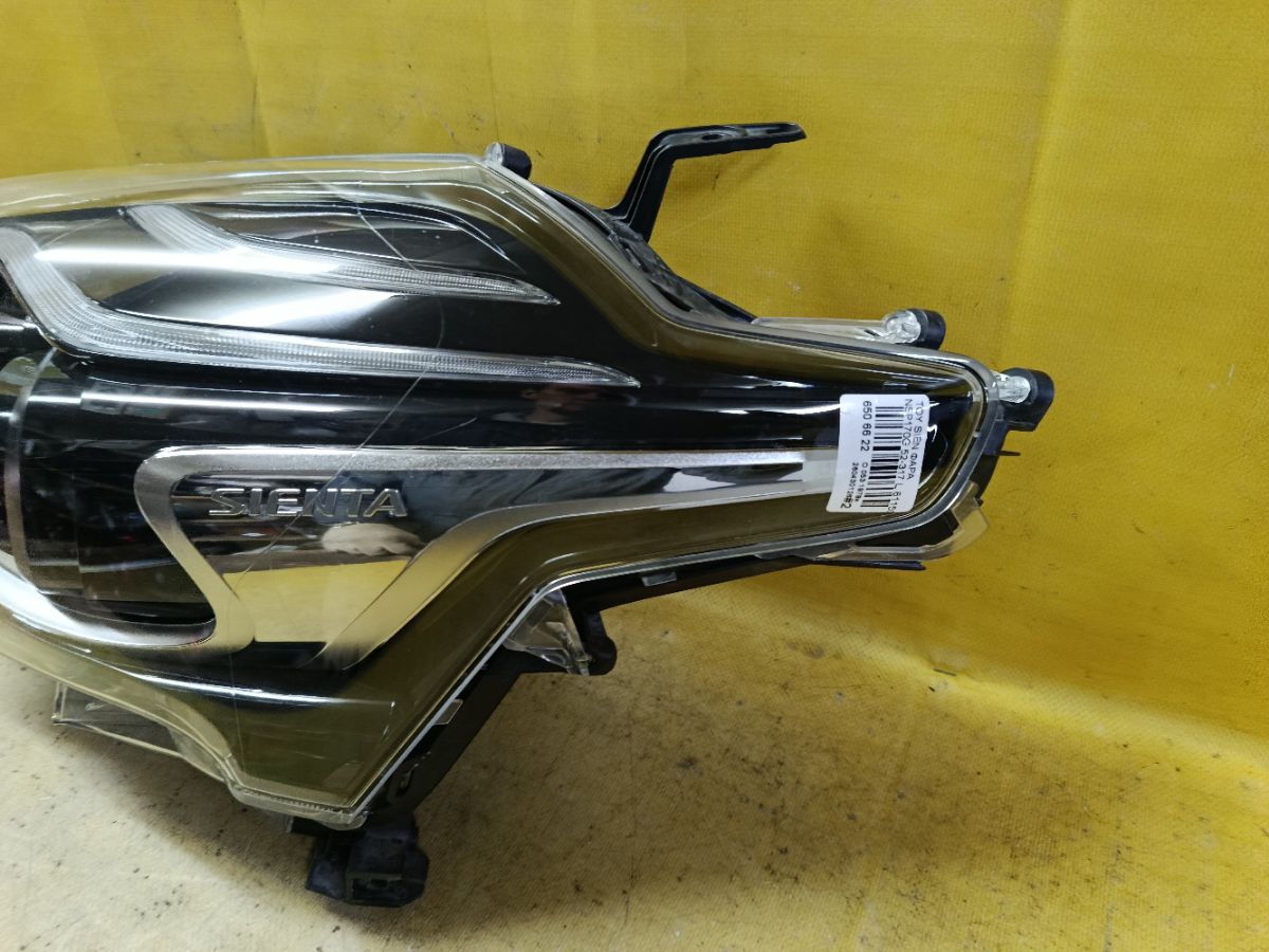 Фара 52-317 52-317,81150-52N00 на Toyota Sienta NSP170G Фото 2