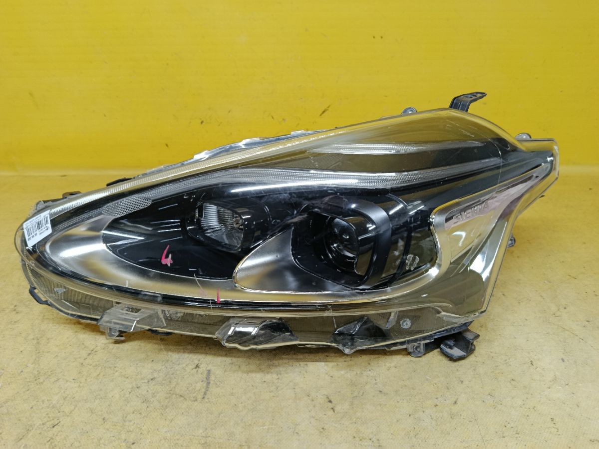 Фара 52-317 52-317,81150-52N00 на Toyota Sienta NSP170G Фото 1