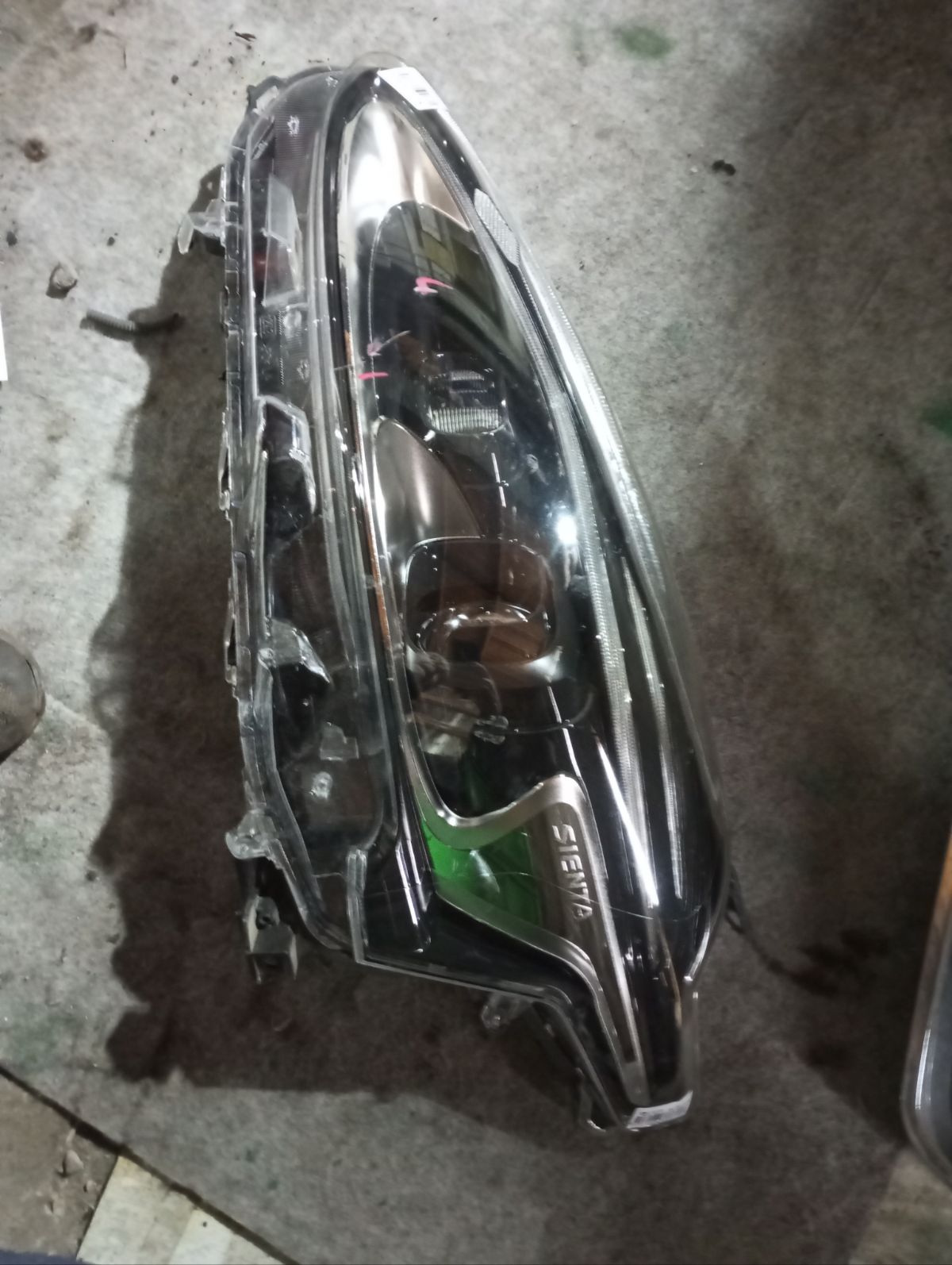 Фара 52-317 52-317,81150-52N00 на Toyota Sienta NSP170G Фото 7